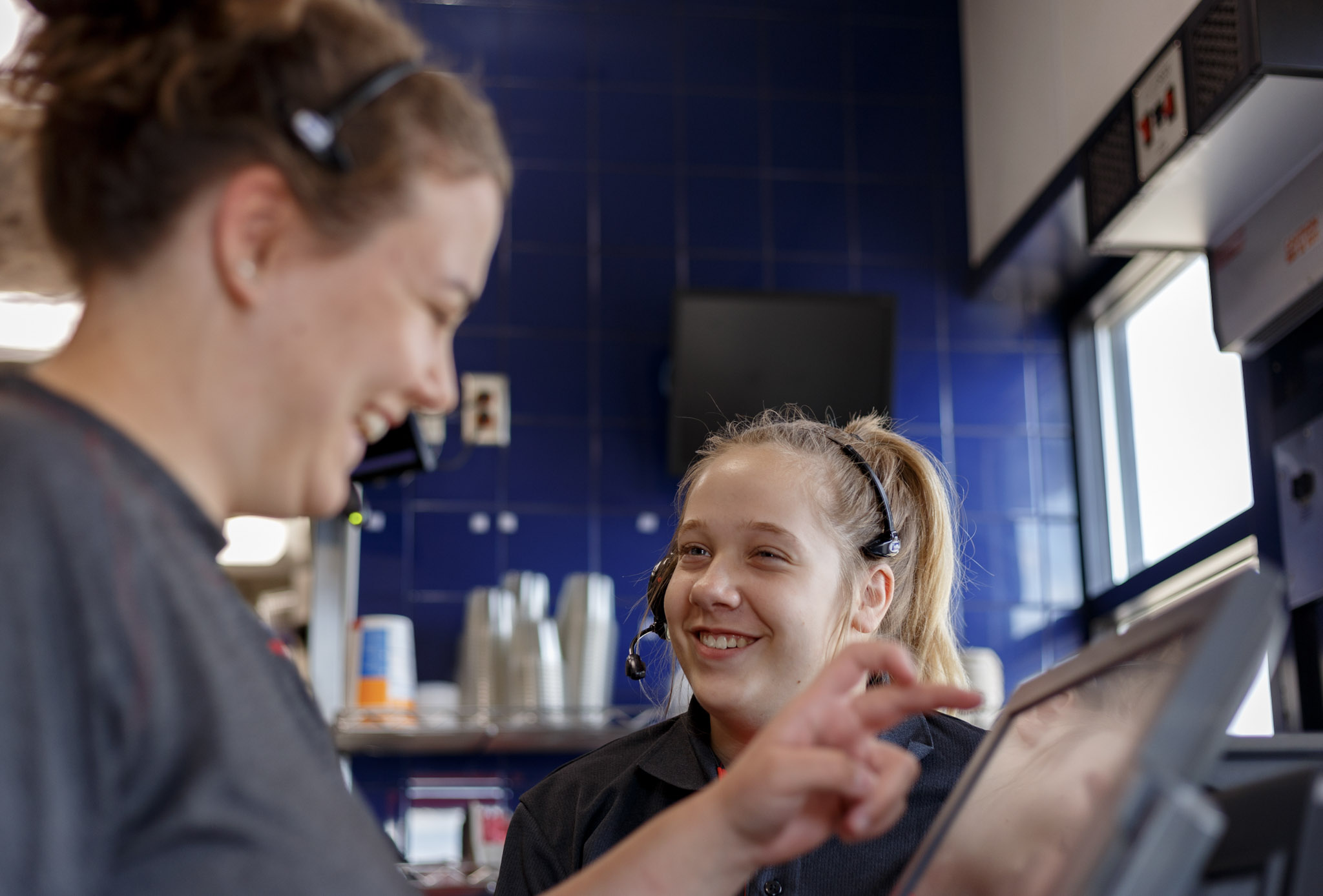 two Dairy Queen staff having fun at work